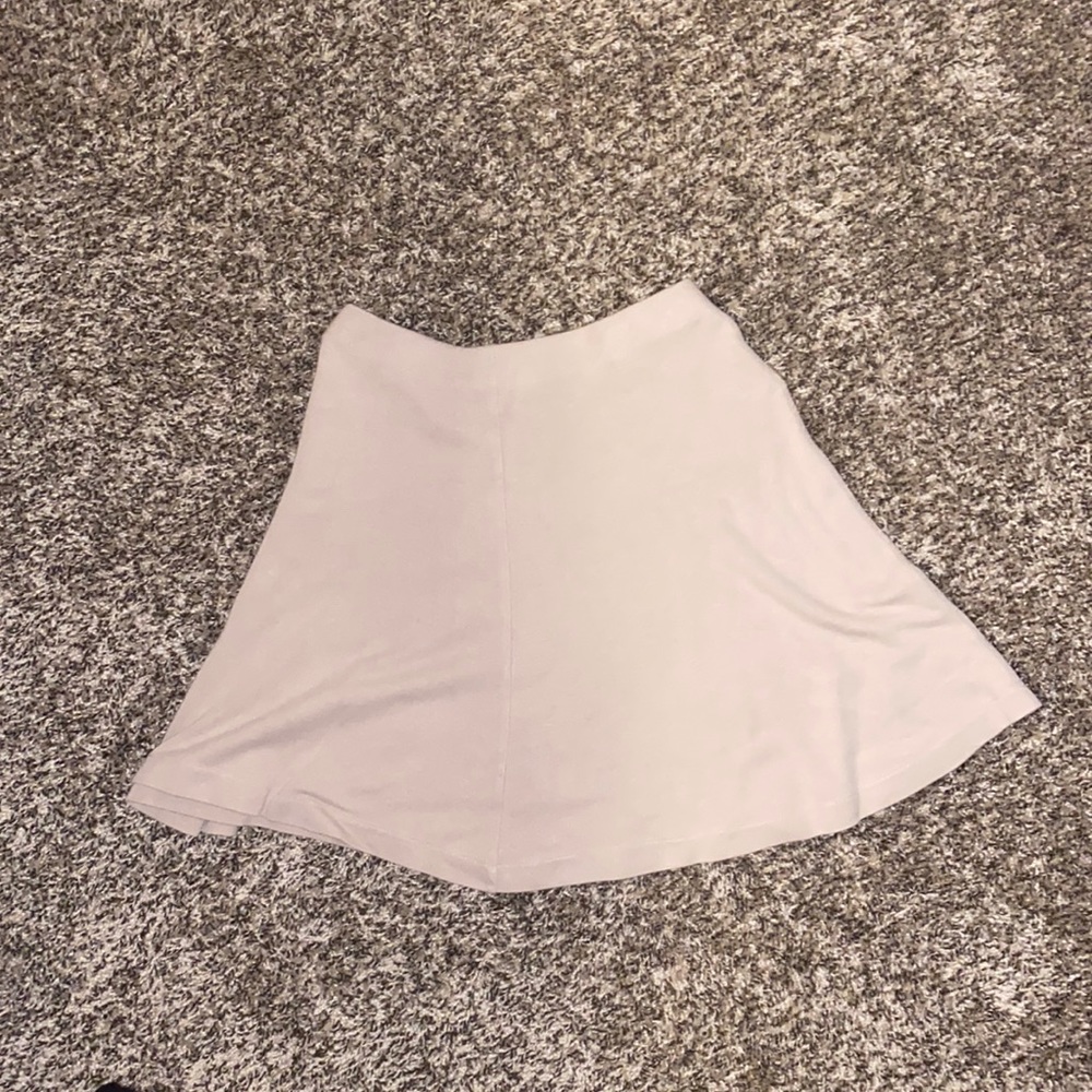 Nude peplum skirt